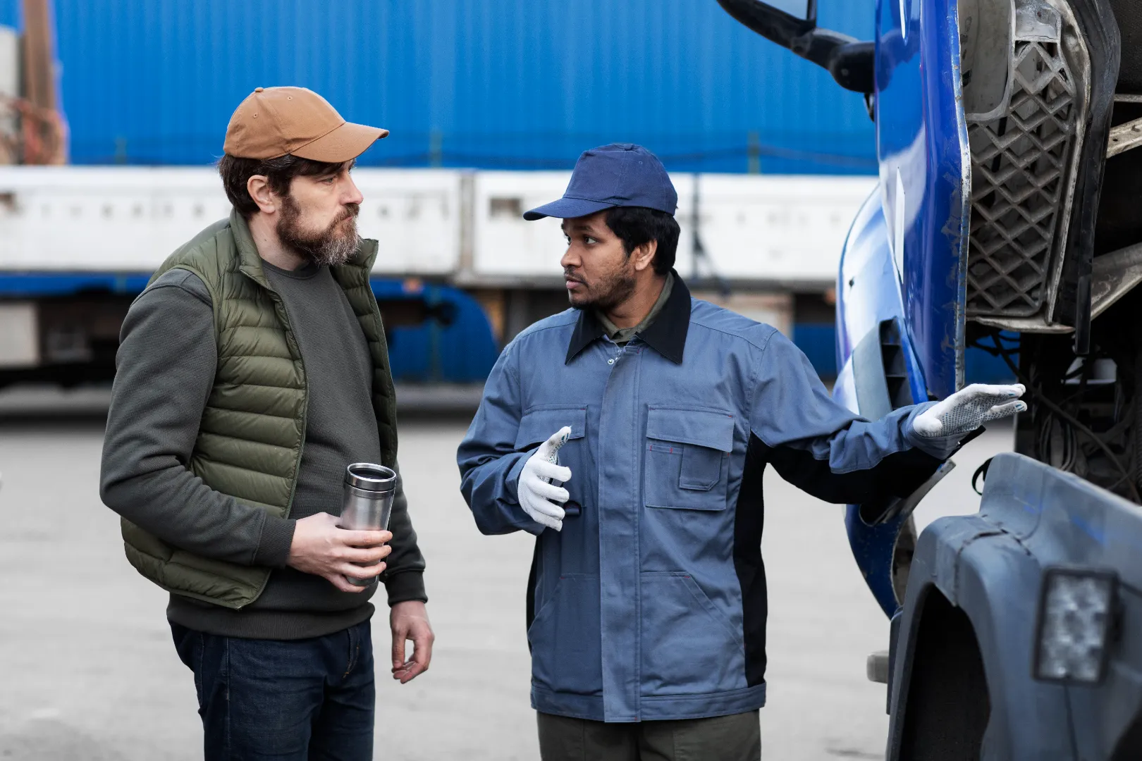 compressed_men-looking-inside-truck-side-view